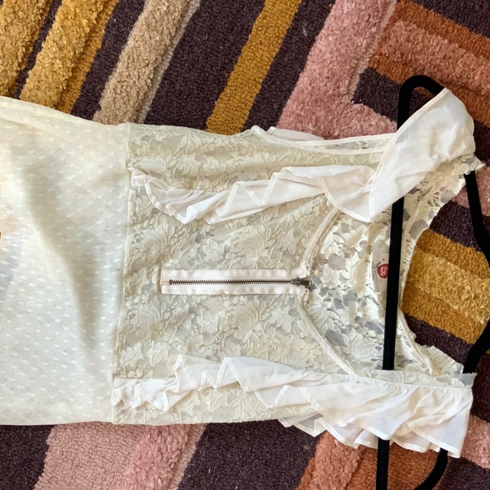 Free People three cream-colored materials top